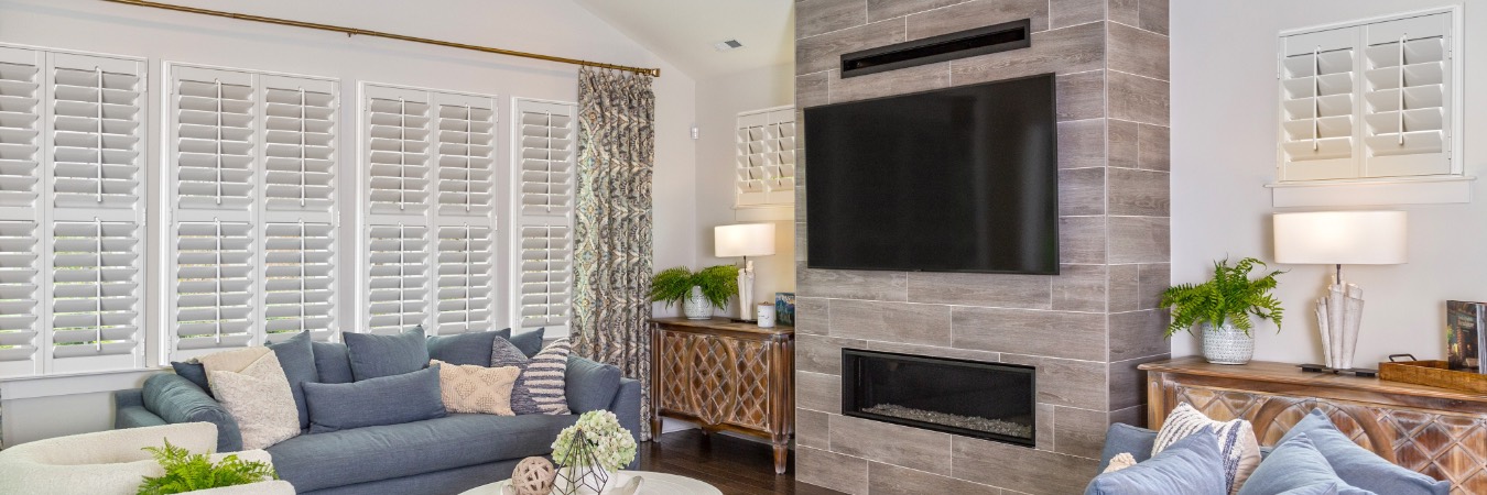 Interior shutters in Eagan living room with fireplace